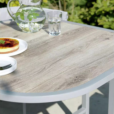 Maximize Your Outdoor Space with this Space Saving Rattan Weave and Steel Dining Set