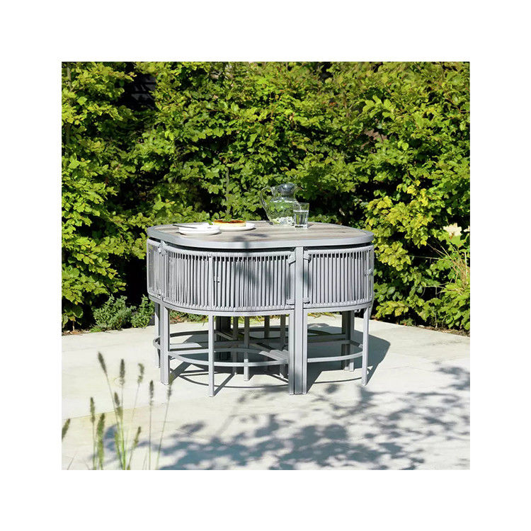 Maximize Your Outdoor Space with this Space Saving Rattan Weave and Steel Dining Set